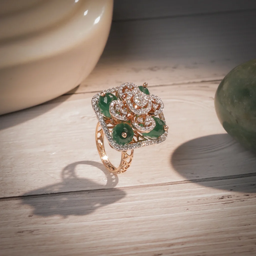 Rose gold cocktail ring with emerald and diamond cluster