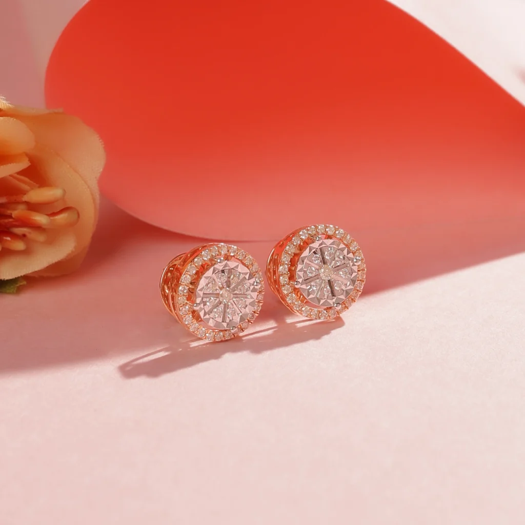 Rose gold round diamond stud earrings on beige background