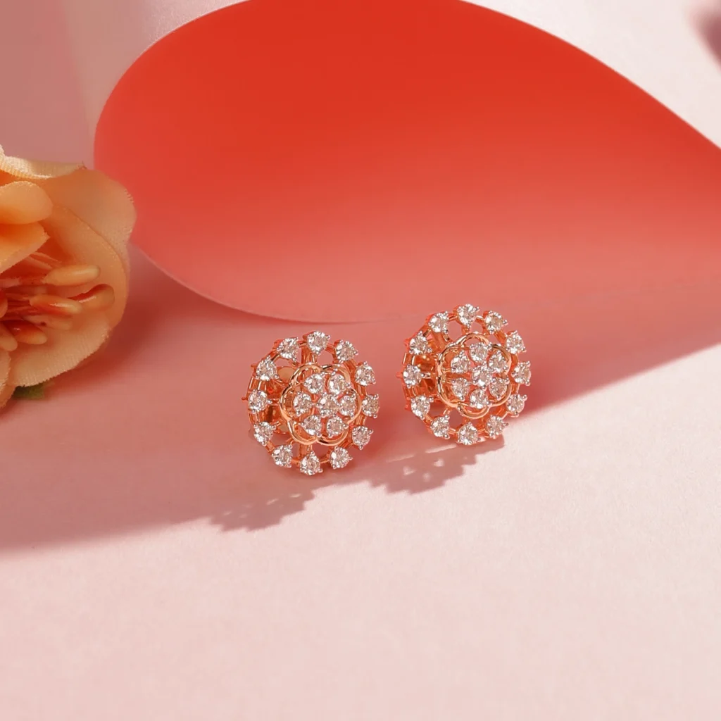 Diamond stud earrings on coral red background