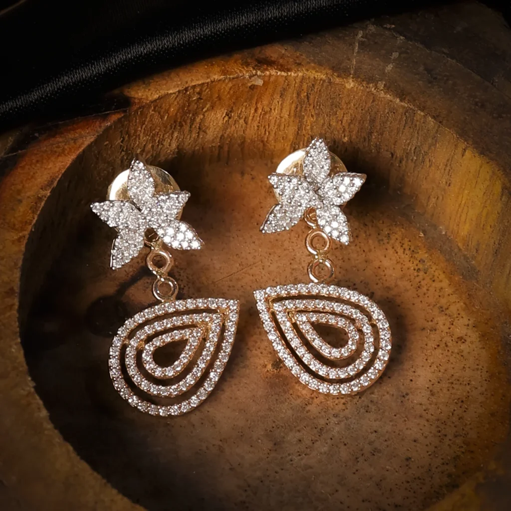 Set of three diamond earring designs product photography