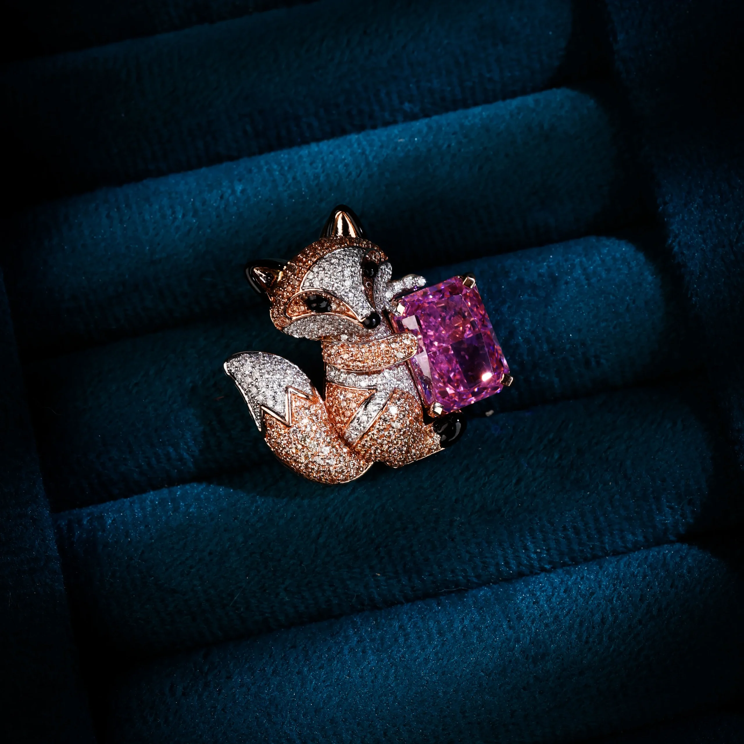 Diamond squirrel brooch with pink gemstone accent